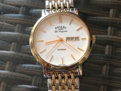 cần tiền bán gấp đồng hồ thuỵ sỹ chính hảng (pin) ROTARY. 4TRIEU