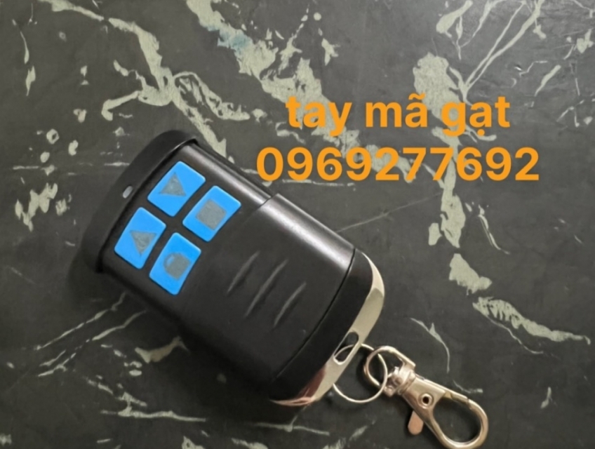 Tay điều khiển cửa cuốn