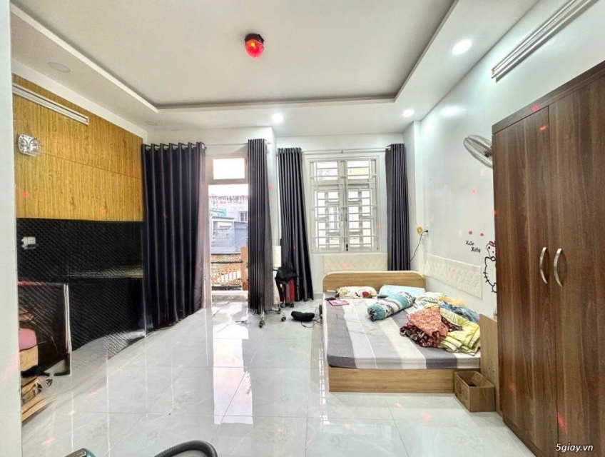 Nhà Q7 gần khu Him Lam hẻm xe hơi full nội thất