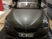 Mô hình BMW 6 series Gran Coupe 1:18 và quái vật ZINOGRE trong game Monster Hunter