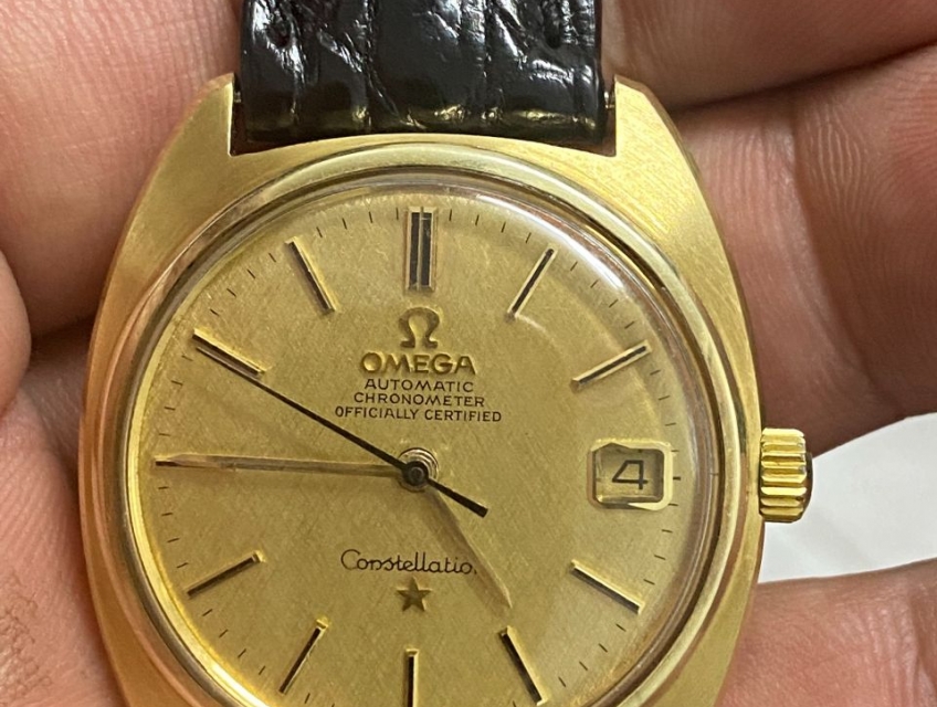 Omega contelation võ + mặt số bằng vàng đúc 18k