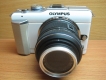 Olympus PEN E-PL1+Lens Kit 14-42mm F3.5-5.6(white) mới 98 hình thật...