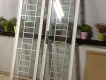 Bán 2 cánh cửa và 2 bộ cửa sổ trượt hai cánh (vật liệu nhôm-kính-song sắt)