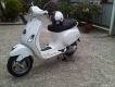Vespa Lx125ie màu trắng leng keng xà beng cần ra đi để đổi xe,chủ yếu trùm mền