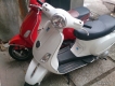 Vespa trắng đk 2012