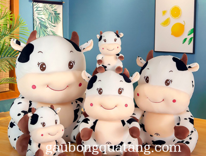 GẤU BÔNG BÒ SỮA NGỒI .