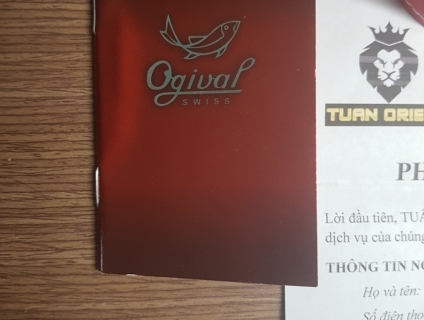 Cần bán đồng hồ thụy sỹ nam OGIVAL LƯỠNG LONG CHẦU NGUYỆT