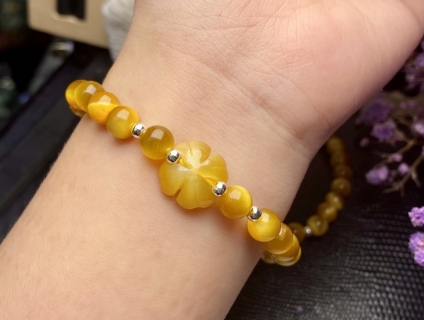 Vòng mắt hổ vàng tâm sz 6mm mix cỏ 4 lá :1000k. Lh: 0365904086