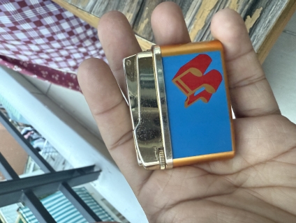 Cần bán quẹt gas nhạc (bật lửa nhạc)