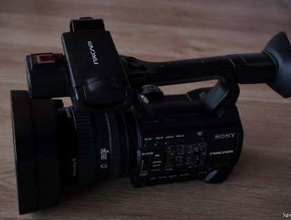 Bán nhanh máy quay Sony NX100 như mới còn bảo hành 15 tháng full fk
