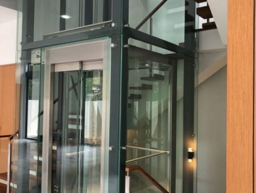 Đơn vị thi công vách kính thang máy chất lượng cao và bảo hành dài hạn