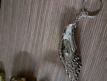 Quẹt móc khóa hình đầu đại bàng end  22h59p 13/10/2019