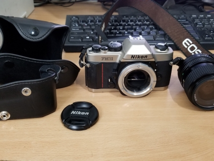 Máy ảnh phim Nikon FM10  + len 35-70